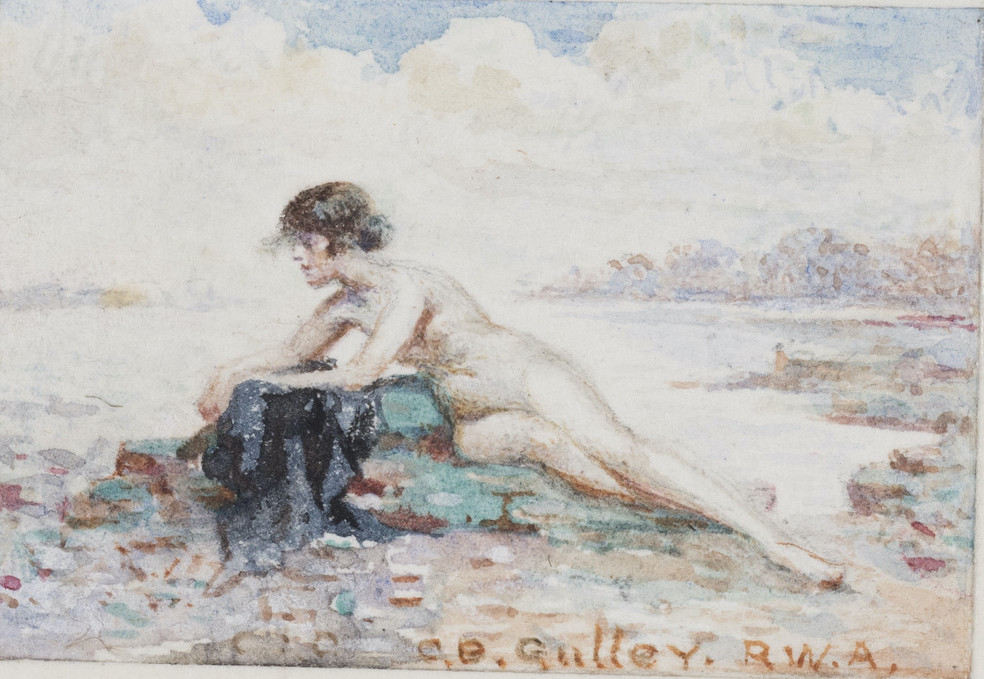 Woman reclining on a beach