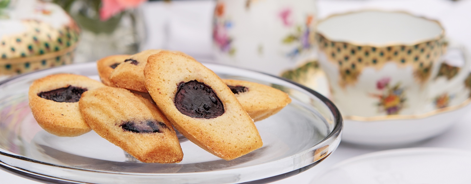 Close up image of cherry madeleines