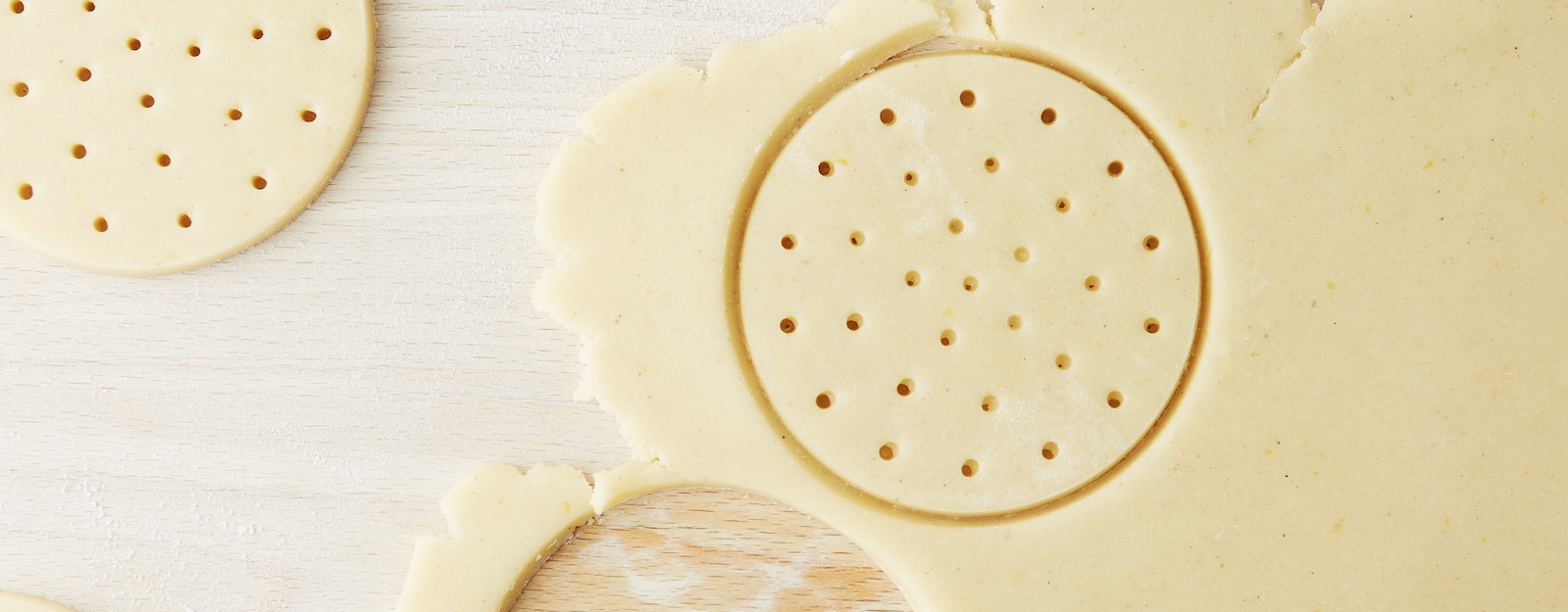 Shortbread in the process of being cut out