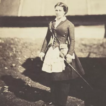 A woman standing in a military camp in the Crimea