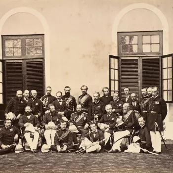 Photograph of the Prince of Wales with staff and suite, outside Goverment House, including Captain A. Fitz-George, Captain Durrant, Lord Aylesford, Francis Knollys, Sir Dighton Probyn, Lord Alfred Paget, Sir Joseph Frayer, Cannon Duckworth, the Earl of Gr