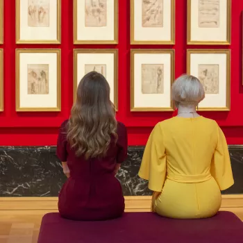 Two people enjoying the Leonardo exhibition in The Queen's Gallery