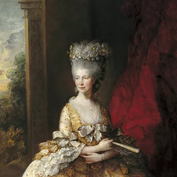 Queen Charlotte wearing a gold tasseled silk dress.